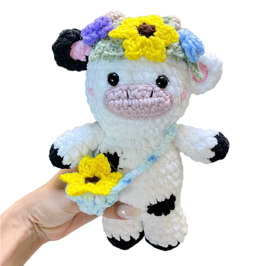 Vaca con diadema de flores